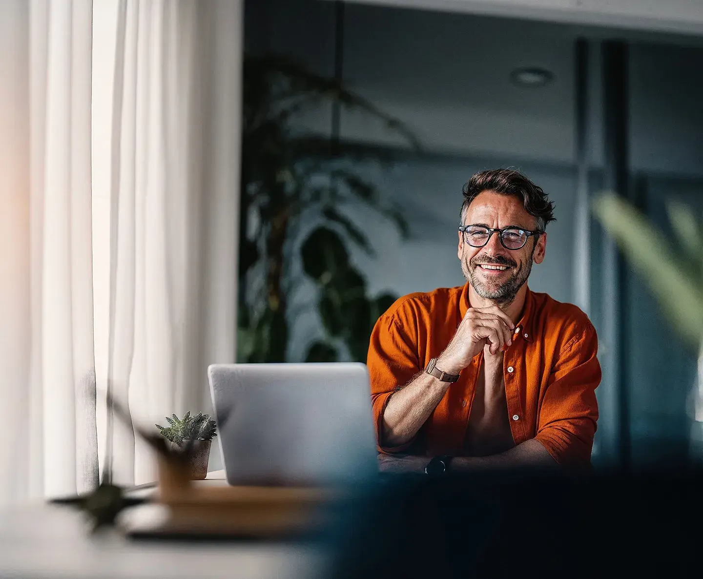 smiling man in office